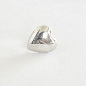 Vintage small silver heart shaped lapel pin